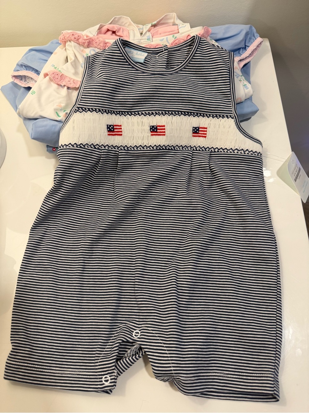 Petit Babe Navy Striped Smocked Baby Romper with Flag Detail